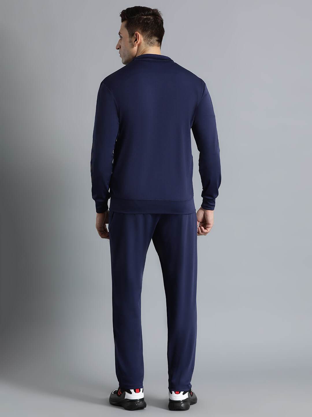 Promo All-Weather Polyester Tracksuit - Hummel India
