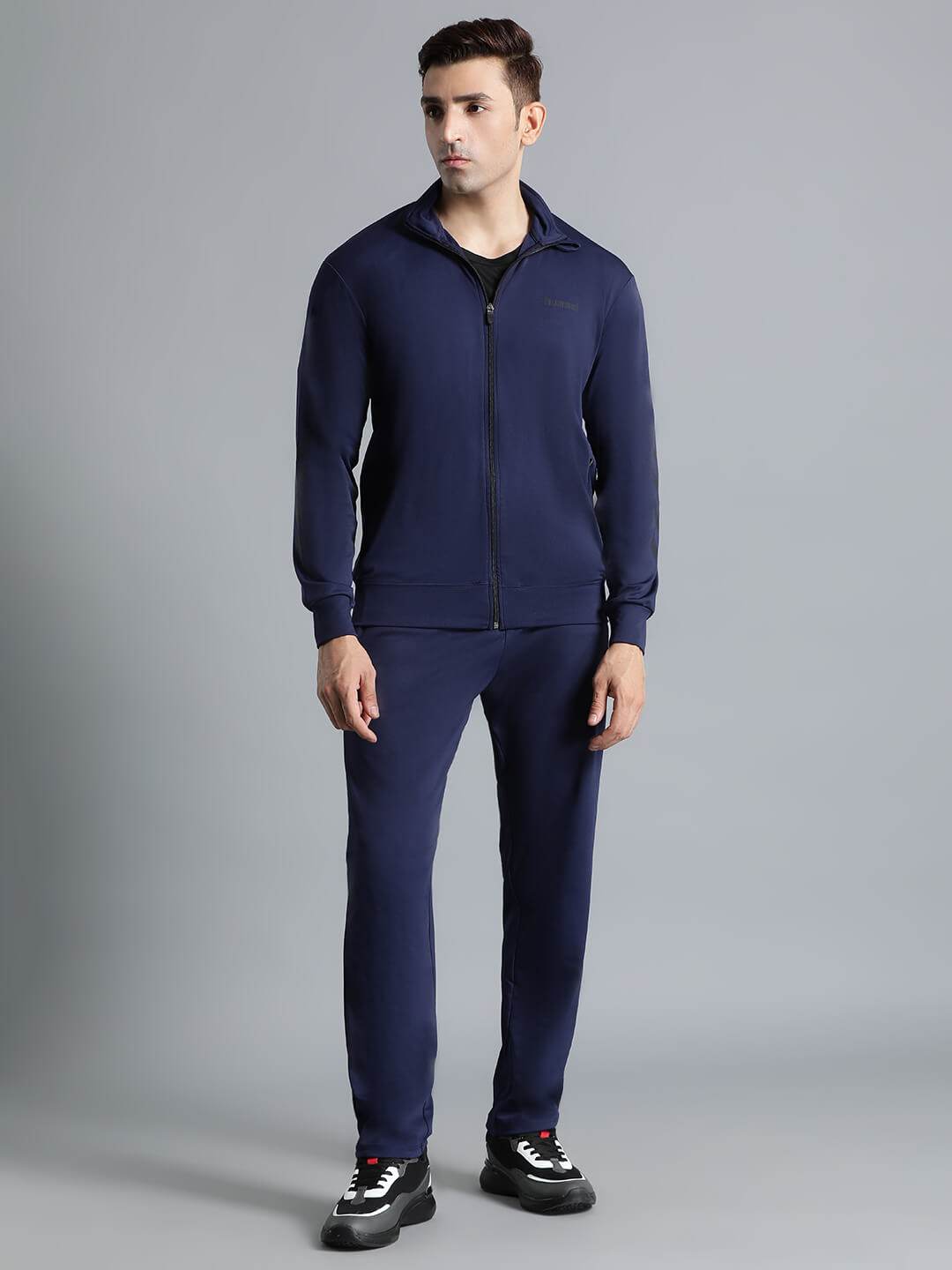 Promo All-Weather Polyester Tracksuit - Hummel India
