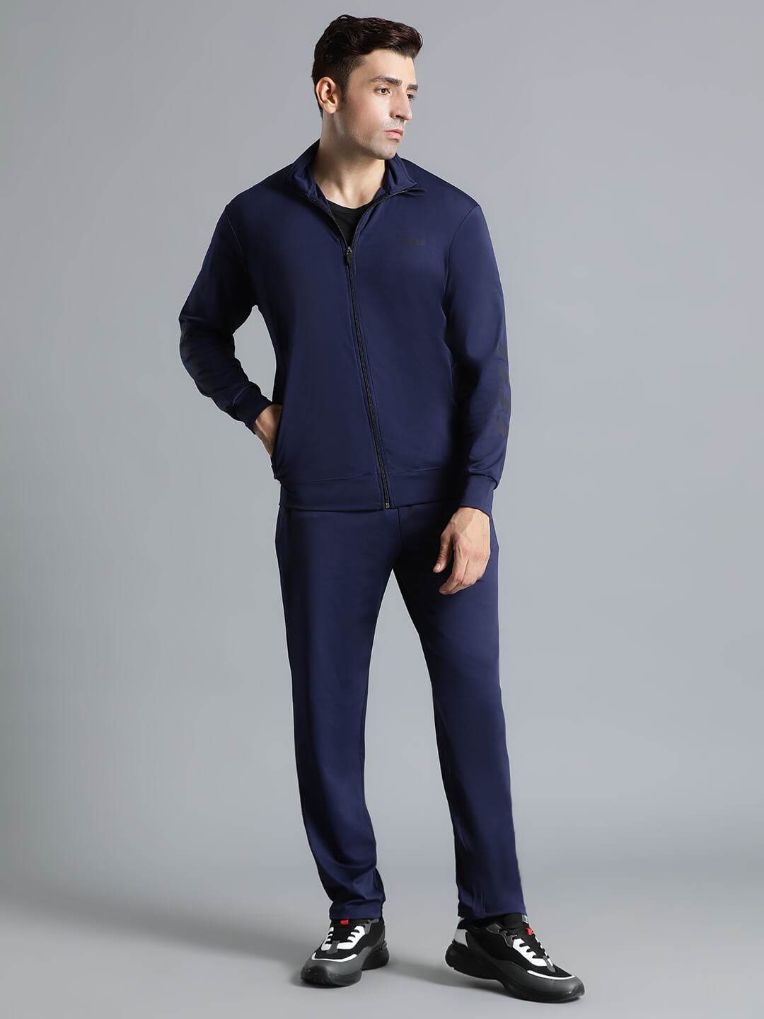 Promo All-Weather Polyester Tracksuit - Hummel India