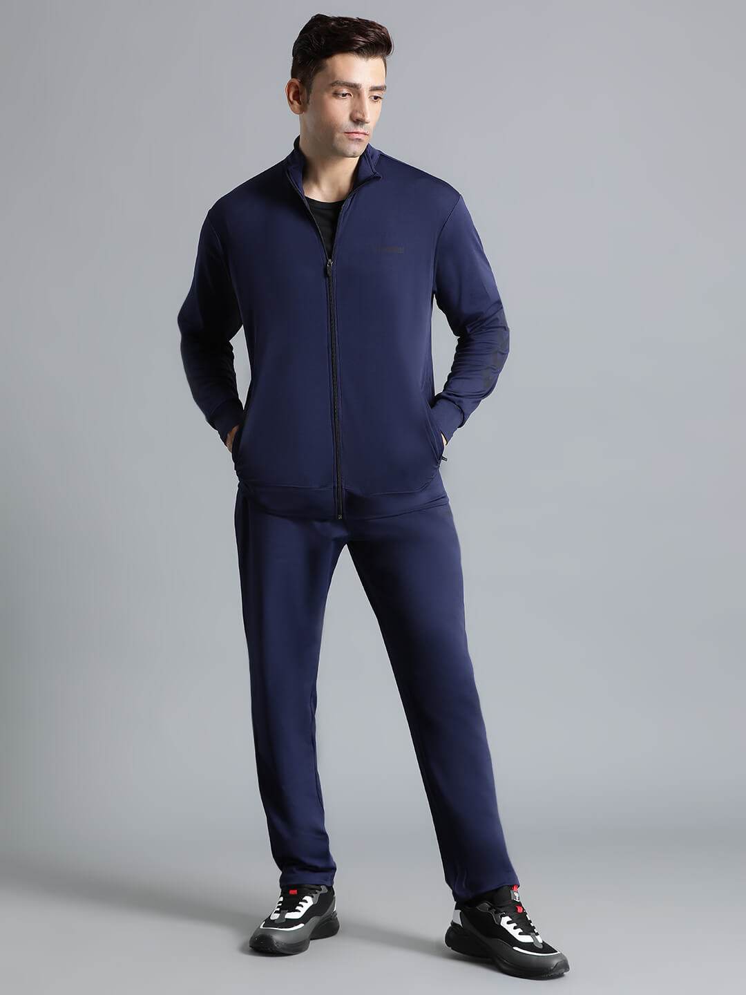 Promo All-Weather Polyester Tracksuit - Hummel India