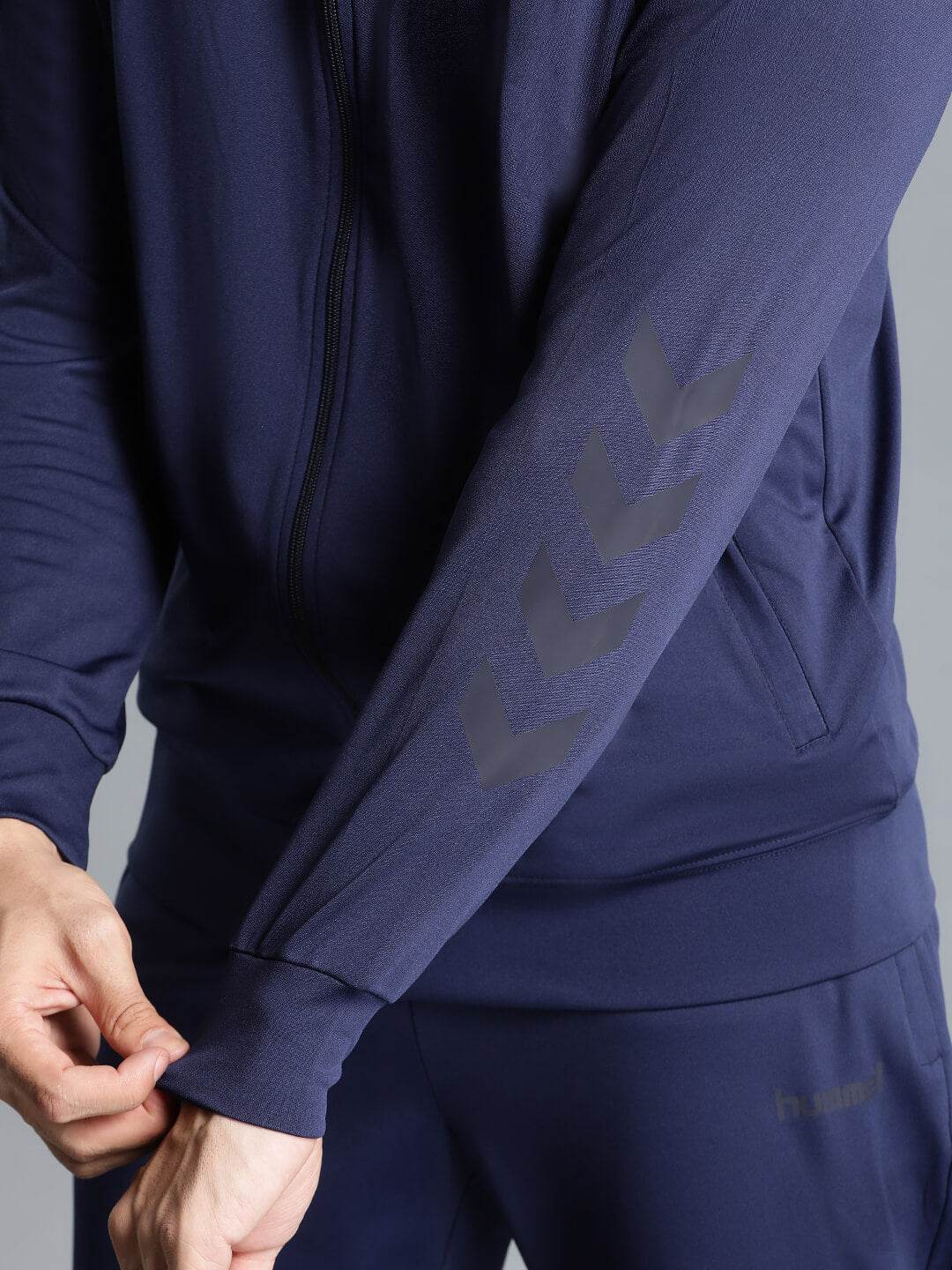 Promo All-Weather Polyester Tracksuit - Hummel India
