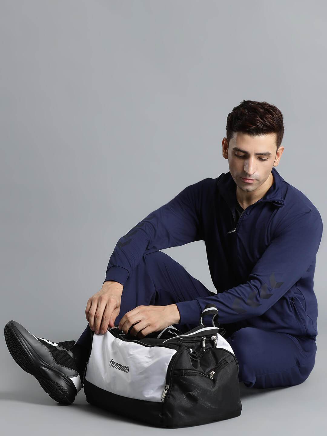 Promo All-Weather Polyester Tracksuit - Hummel India
