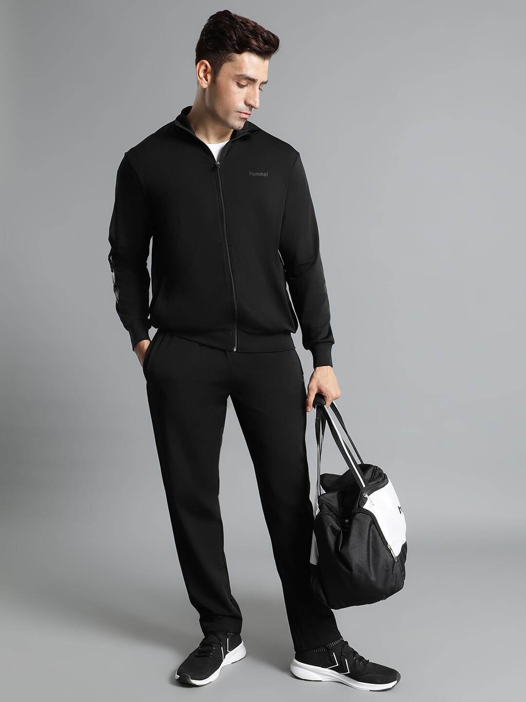 Promo All-Weather Polyester Tracksuit - Hummel India