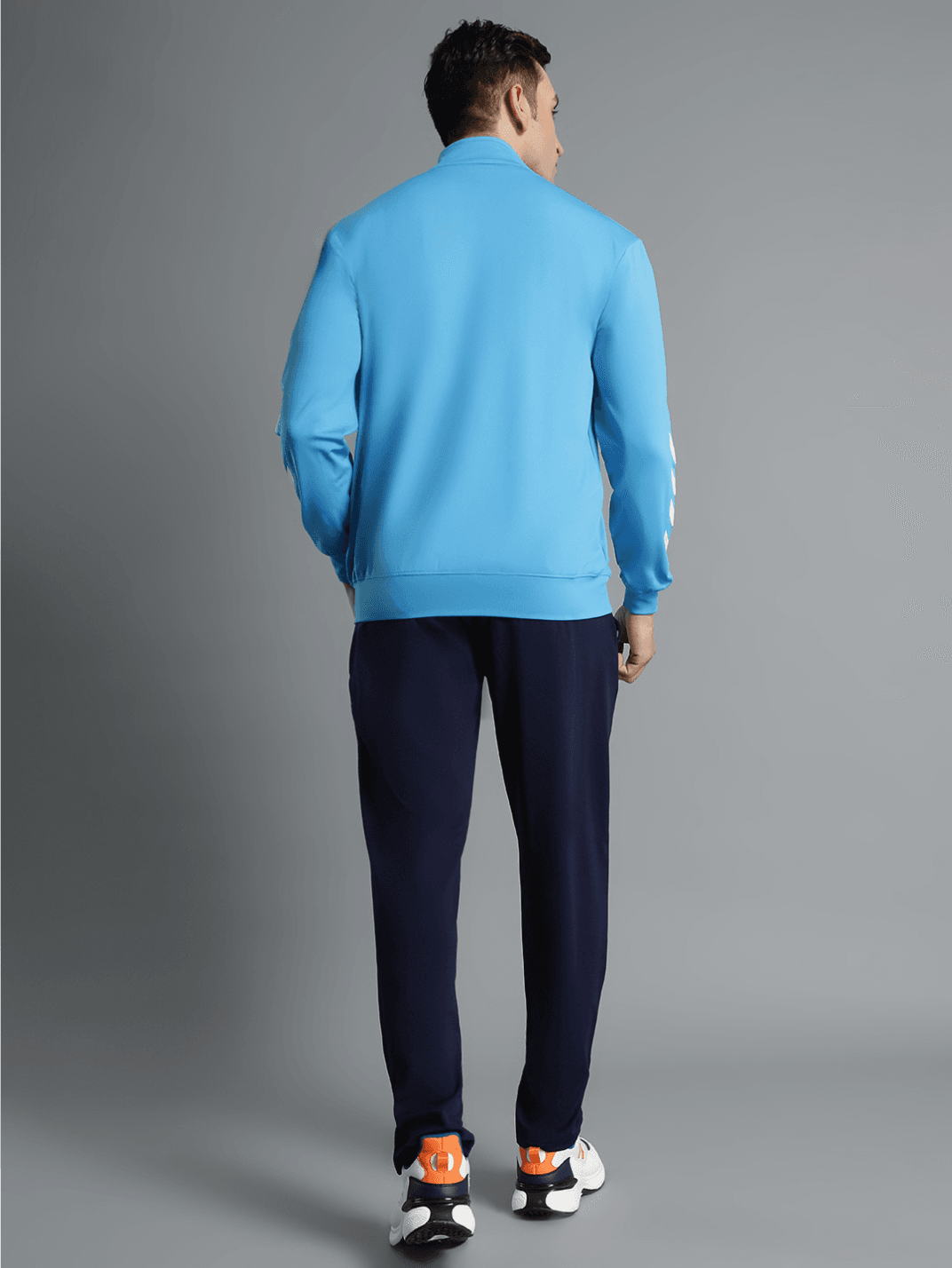 Promo All-Weather Polyester Tracksuit - Hummel India