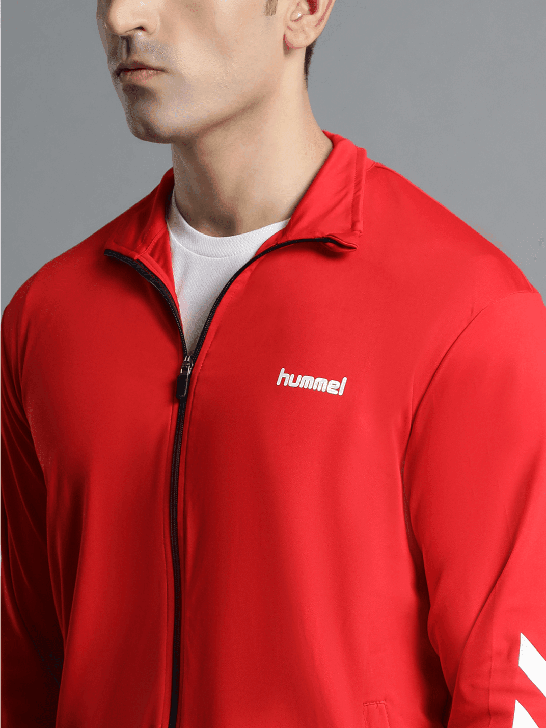 Promo All-Weather Polyester Tracksuit - Hummel India