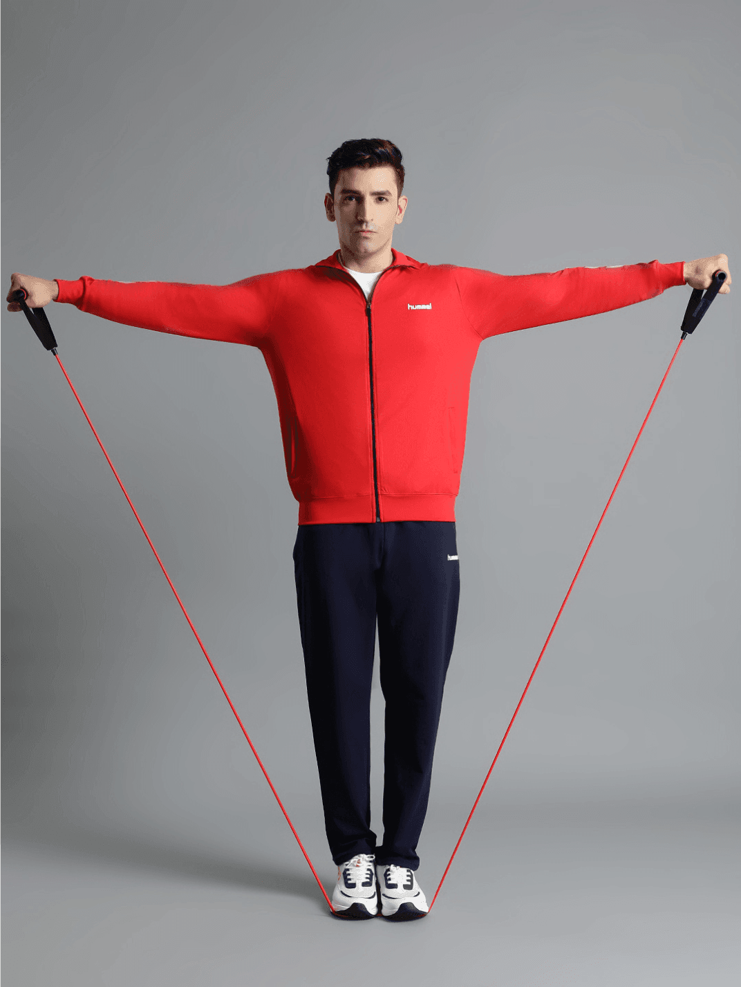 Promo All-Weather Polyester Tracksuit - Hummel India