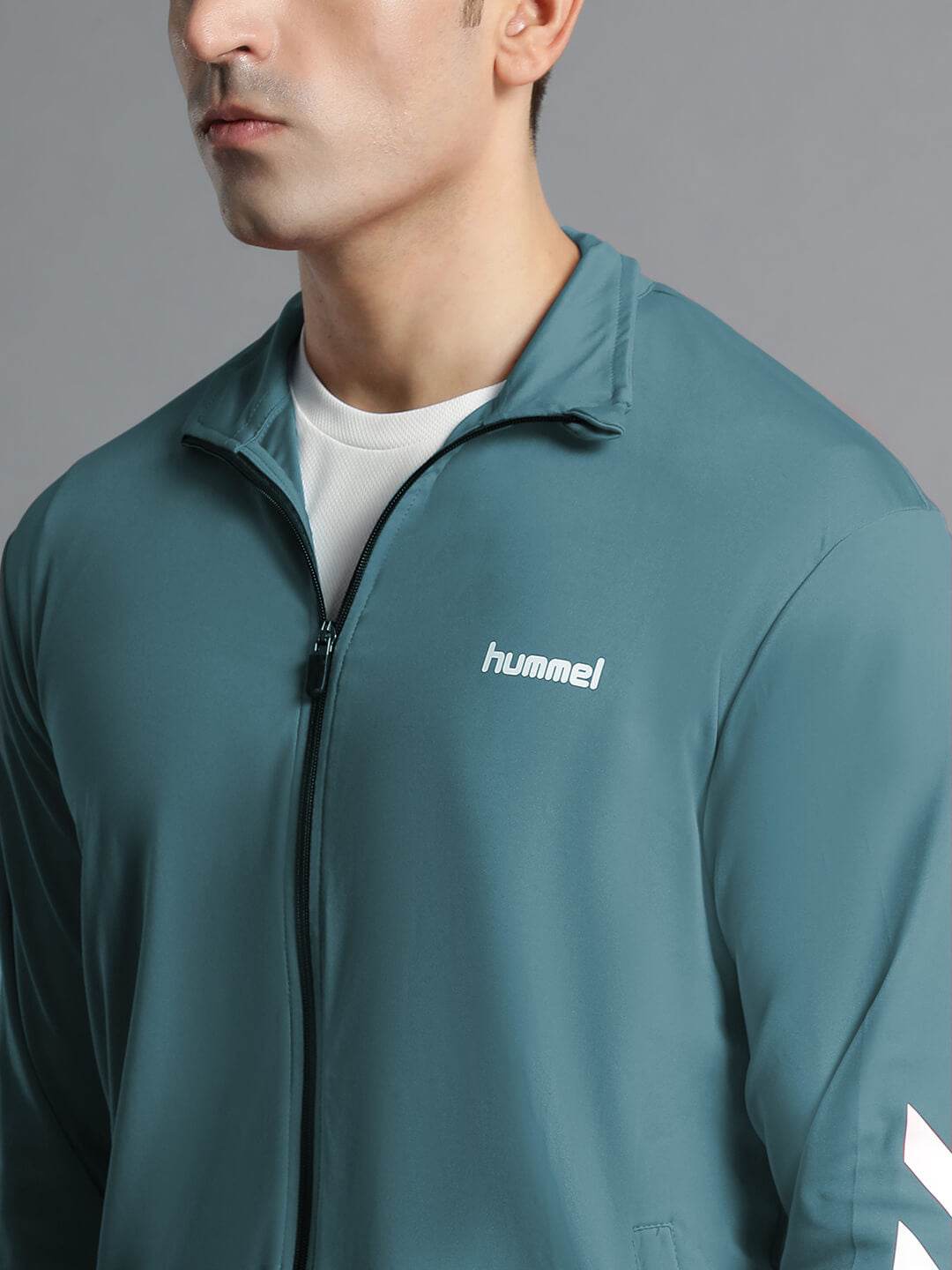 Promo All-Weather Polyester Tracksuit - Hummel India