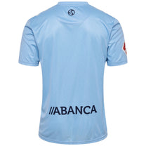 Light blue sports jersey with 'ABANCA' branding on a black background